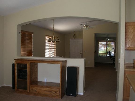 VAULTED CEILINGS WITH PLANT SHELVES IN FORMAL LV ROOM