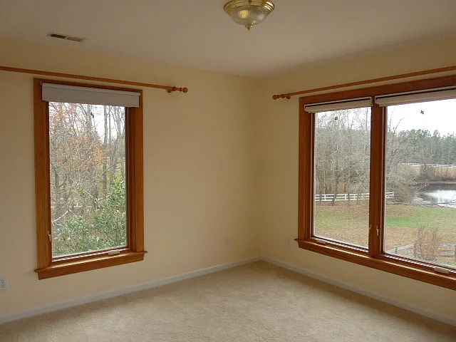 Bedroom overlooking the pond and pasture.