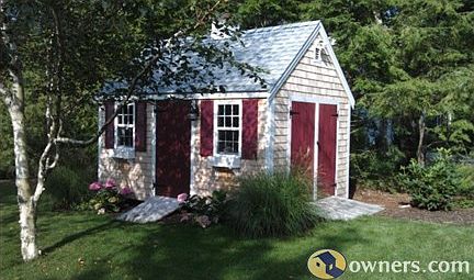 Custom Pine Arbor Shed in back yard