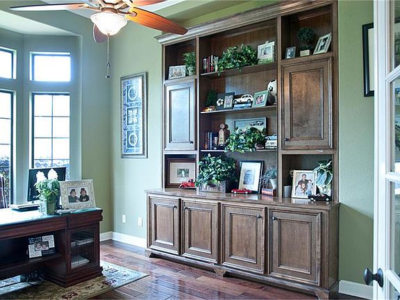  The study features wood flooring and custom built-ins, giving you flexibility in furniture placement.  The double French doors allow you the get the quiet and privacy you need.