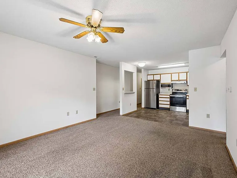 An expansive living area offers plenty of room to relax while maintaining an easy connection to the kitchen.