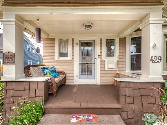 Enjoy the view of the gardens as you sit on your covered porch during all the seasons.