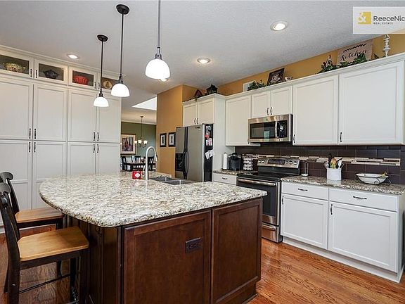 Recently remodeled kitchen with large island and large pantry