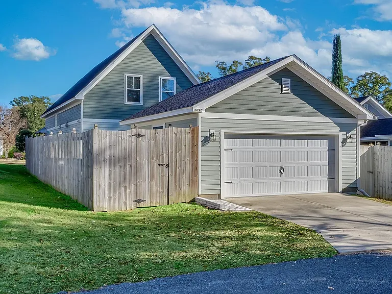 Two car garage, access via alley