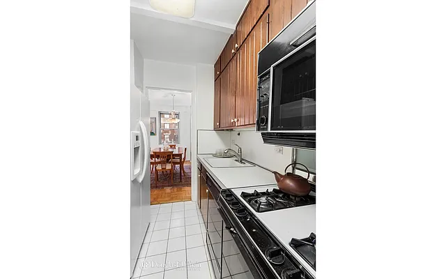 Sold by Douglas Elliman | media 18