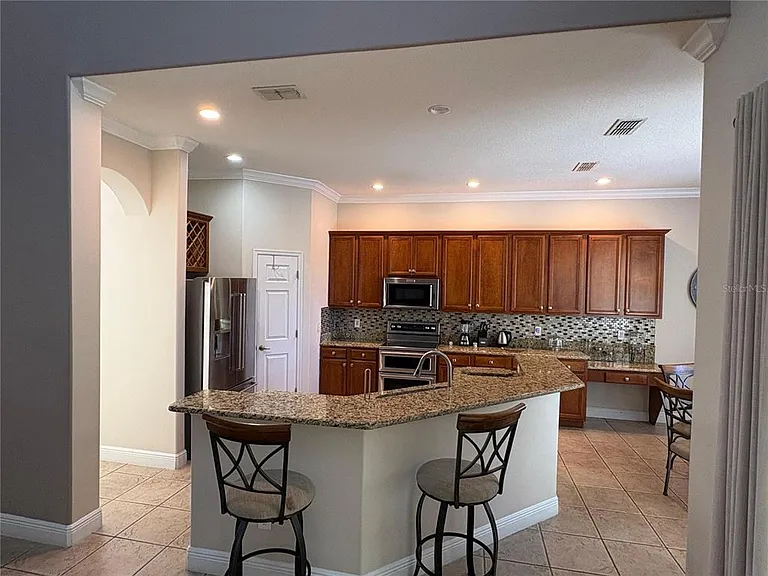 9718 Pineola Dr — Photo 13