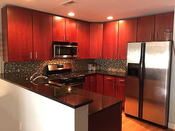 Full kitchen with granite counters