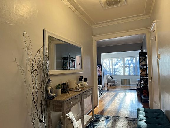 Foyer going into the living room and sun room