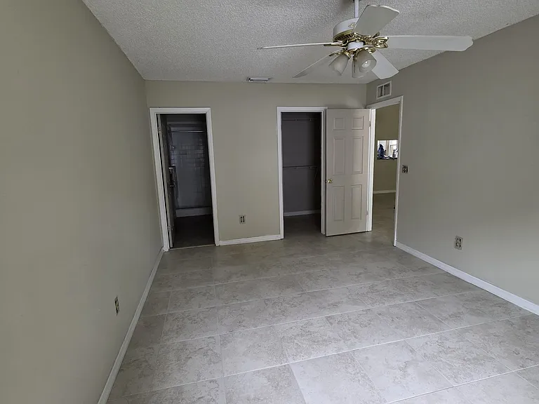 Master bedroom - door on left to master bathroom - door on right to walk in closet