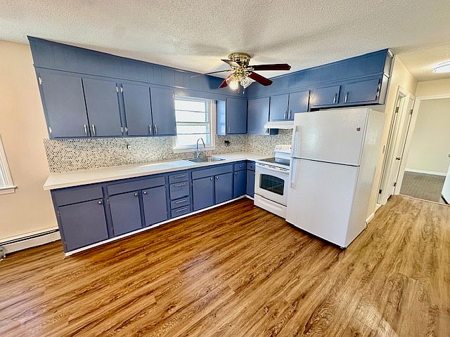 New refrigerator and laminate flooring