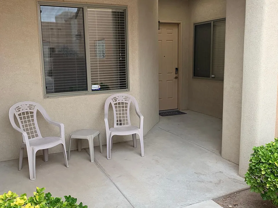 Front entrance through gated courtyard.