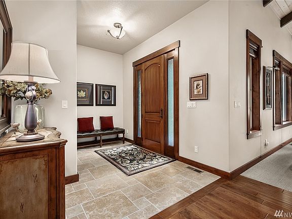 Welcoming Foyer. Beautiful Tile Entry.