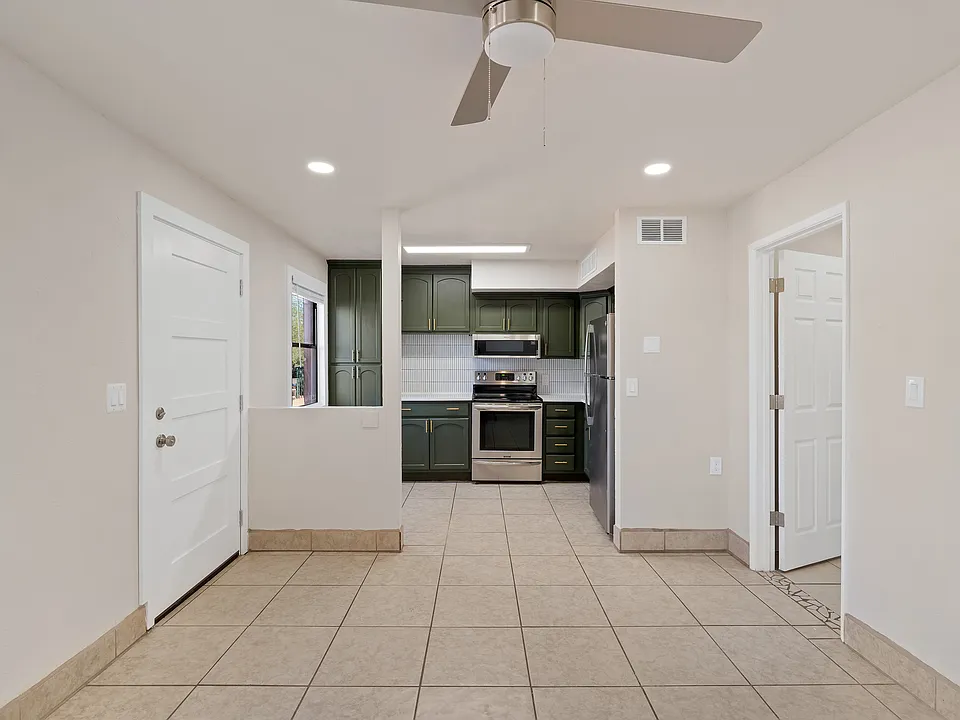 View from living room looking into kitchen.