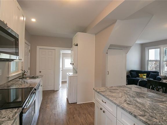 Eat in kitchen with all new stainless steel appliances