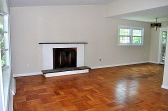 Hardwood floors and wood burning fireplace