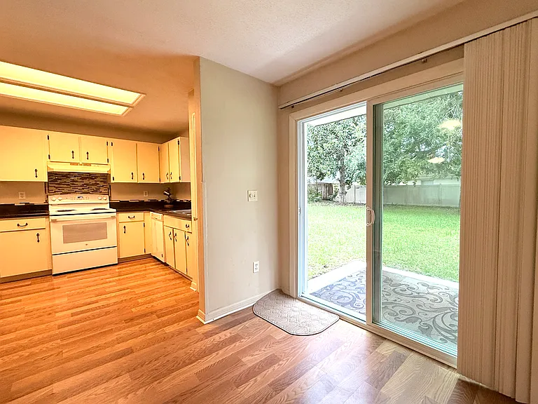 Sliding Doors to Spacious Backyard