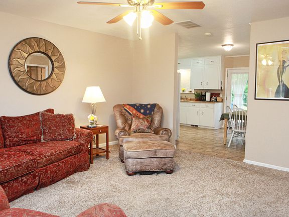 Spacious living area opens to the kitchen