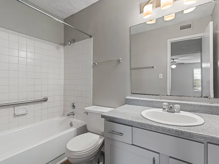 Our Montgomery apartments feature functional bathrooms with quality fixtures and vanity sink, professionally operated by Highlands Vista Group.