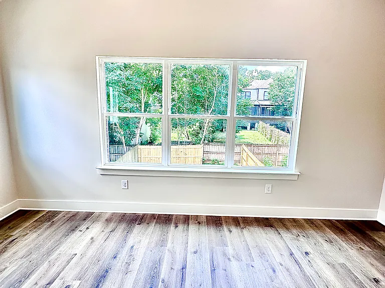 Spacious Master Bedroom Overlooking Backyard