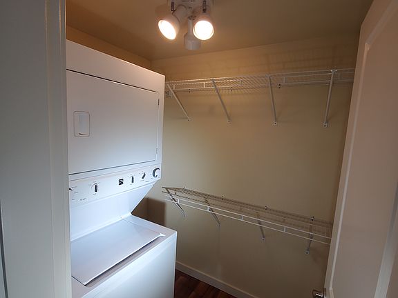 Walk-in closet and laundry center.