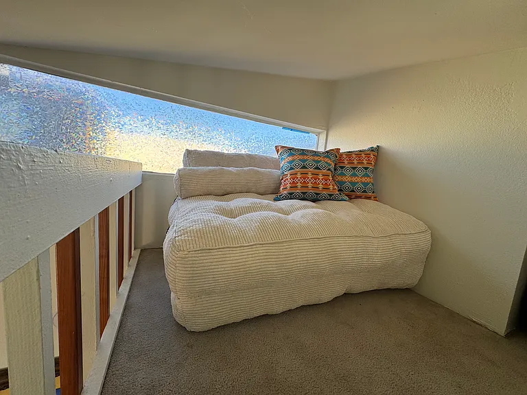 Couch in loft. Opens up into a double bed.
