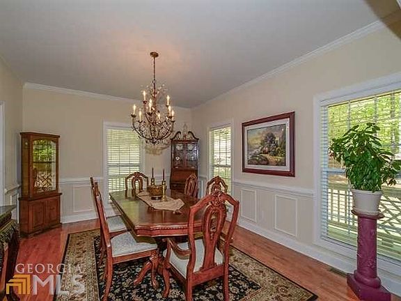 Dining room with hardwood and wainscoting
