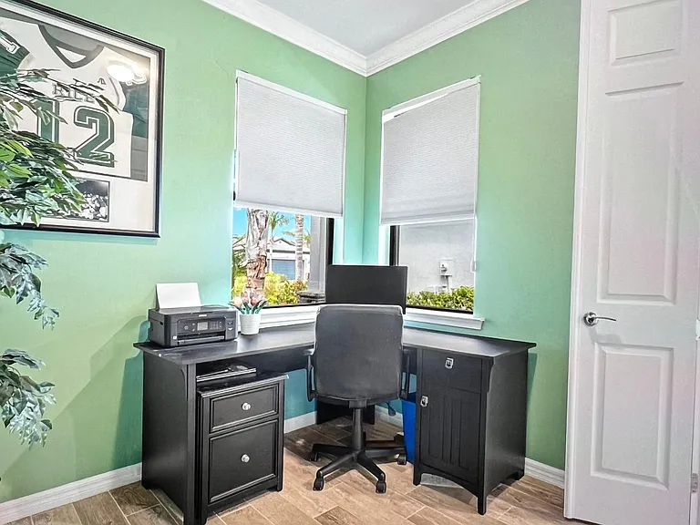 3rd bedroom used as an office with pullout single bed/closet