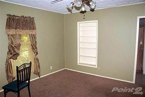 Living room with a nice built-in.