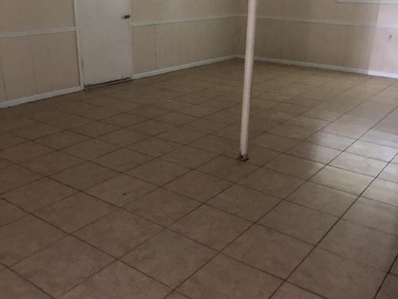 Big Room . In closed carport.