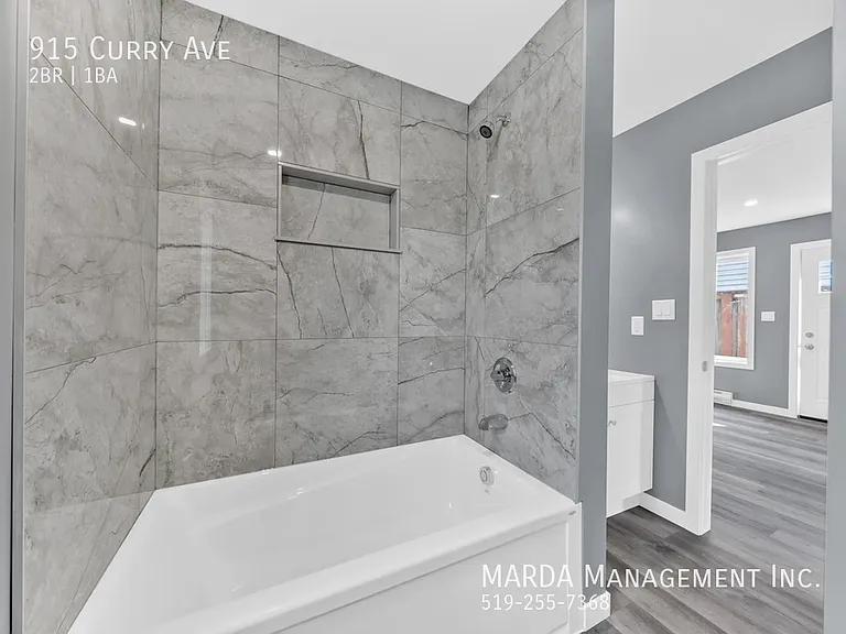 915 Curry Ave — Photo 6