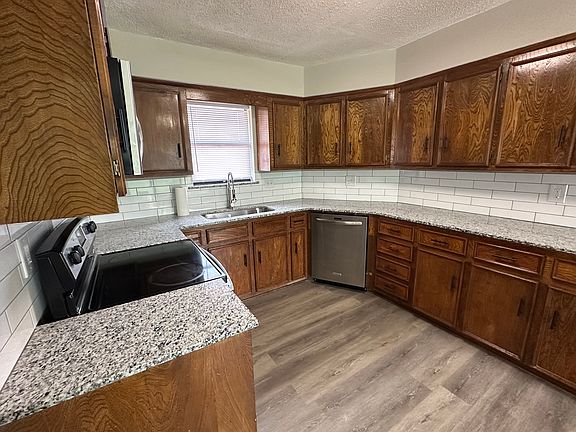 Stainless dishwasher and granite countertops