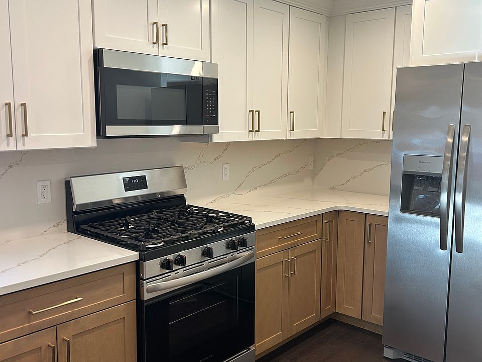 Kitchen with dishwasher and microwave
