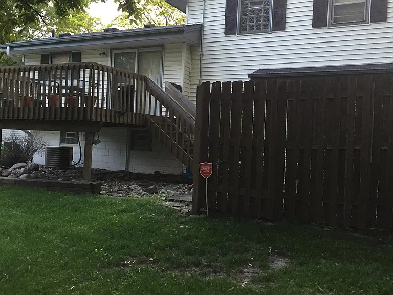 Upper level deck off kitchen/dining area.