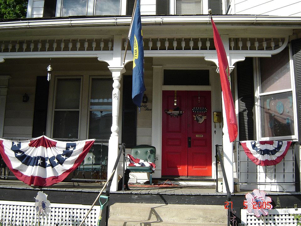 Front porch two red doors