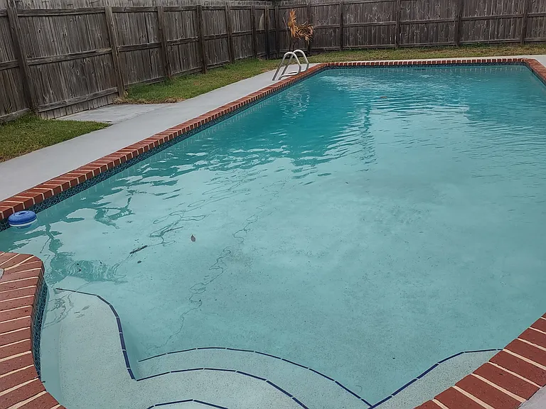 40ft long pool, shallow area 3 ft, deep end 12 ft. Perfect for lap swimming or fun in the sun
