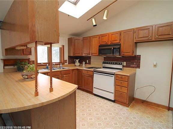 Skylight sheds lots of light on this kitchen.