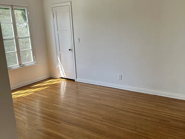 Bedroom #3, with two closets, one is a walk-in