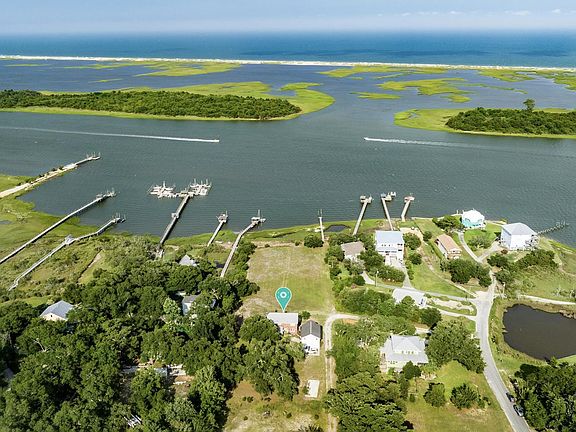 YOUR REASON TO BE WAKE UP DIRECTLY ON THE INTRACOASTAL WATERWAY OVERLOOKING MASONBORO ISLAND SANCTUARY