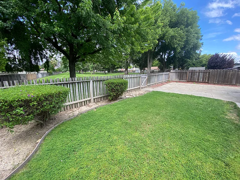 beautiful backyard opens to private home owners association park and access to pool.