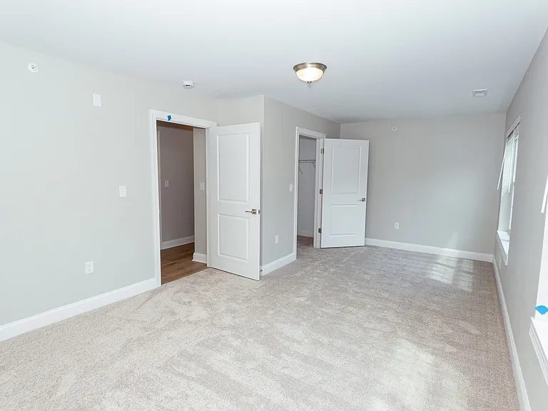 Room from the front corner showing your entrance door and walk in closet locations.