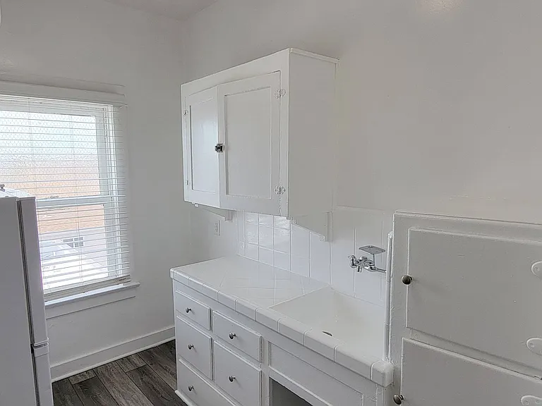 Studio apartment kitchen at the Western at Rosewood apartments in Los Angeles, California.