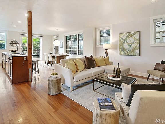 Amazing Great Room features reclaimed floors from Garfield High School.