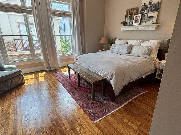 Spacious master bedroom with ensuite bathroom and walk-in closet.