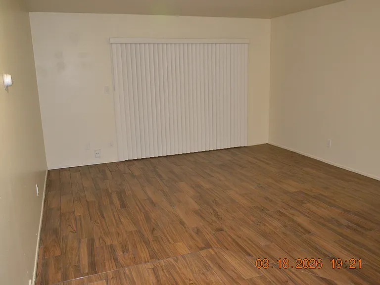 Living Room w/Porcelain Tile Floor
Patio Door