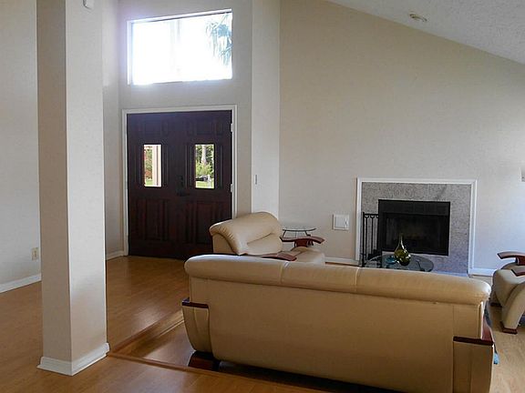 View from formal dining to living room