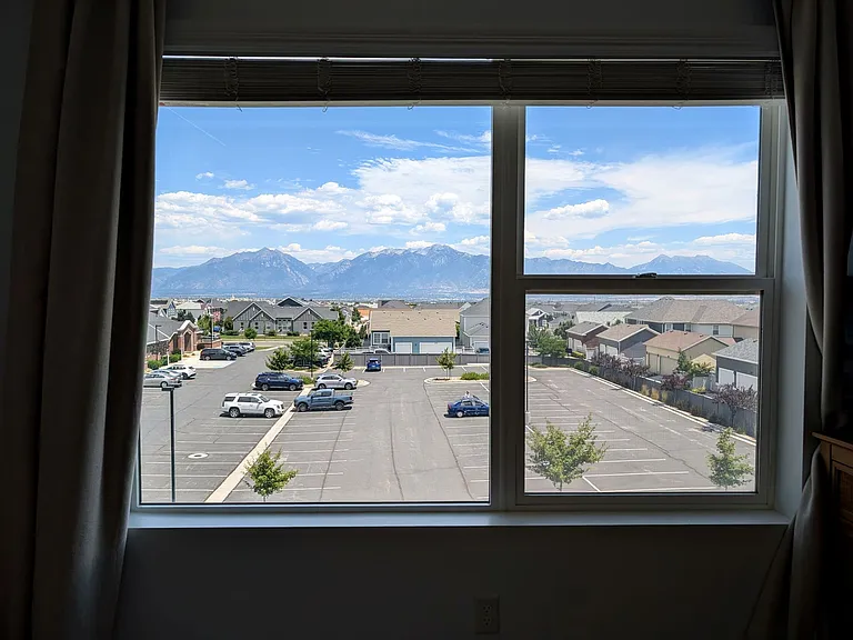 Unobstructed primary bedroom views of valley and mountains