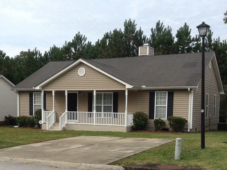 front of house - driveway and street light