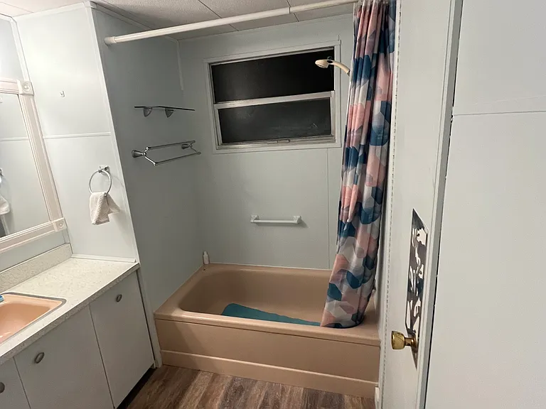 Primary bath has a tub and shower.