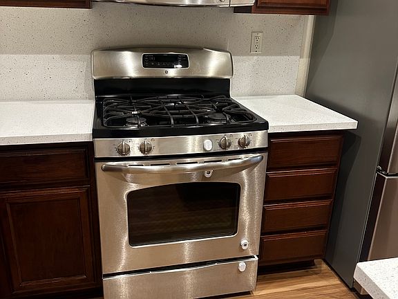 GE Stainless Steel Gas Microwave Hood Oven Grill Range