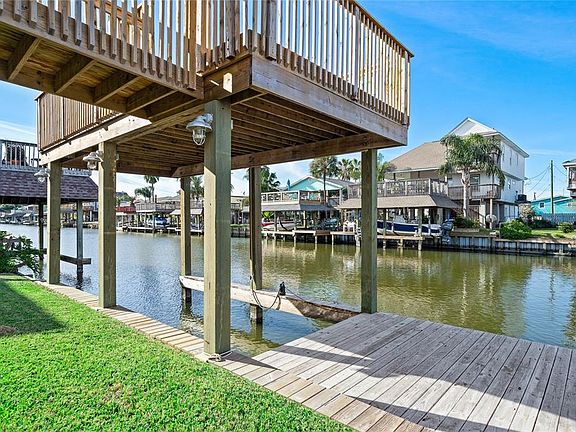 Boat house, slip & party deck